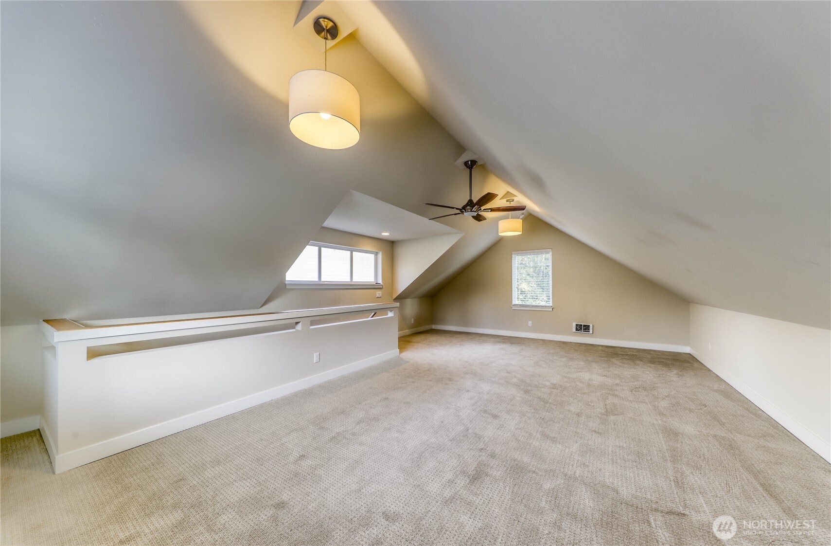690 Wintersweet Road Northeast Bainbridge Island, WA 98110 - Photo 23 of 23 a view of an empty room with a window