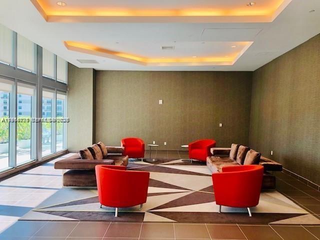 79 Southwest 12th Street, Unit 2402S Miami, FL 33130 - Photo 20 of 23 a room with furniture and window