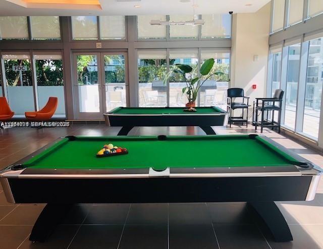 79 Southwest 12th Street, Unit 2402S Miami, FL 33130 - Photo 21 of 23 a view of yard with seating area and green space