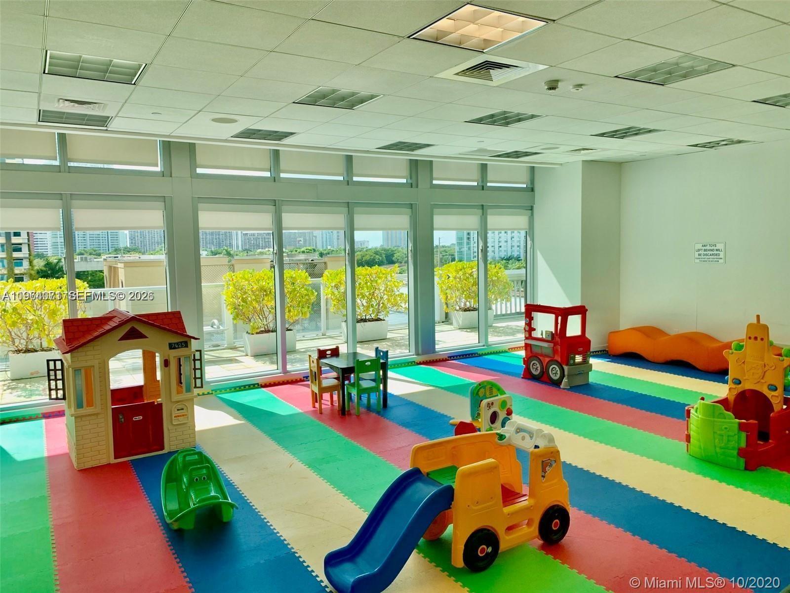 79 Southwest 12th Street, Unit 2402S Miami, FL 33130 - Photo 23 of 23 a play room with toys and toys