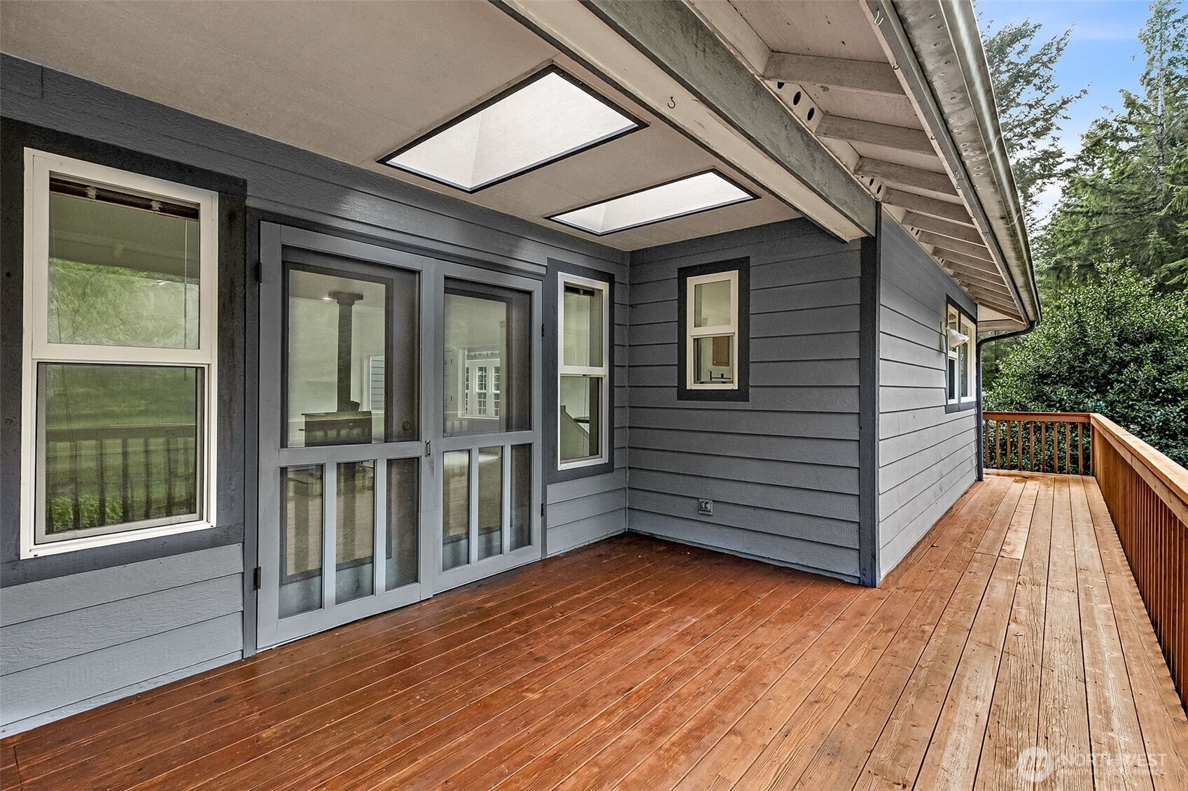 5815 95th Avenue Southwest Olympia, WA 98512 - Photo 13 of 26 a view of a balcony with wooden floor