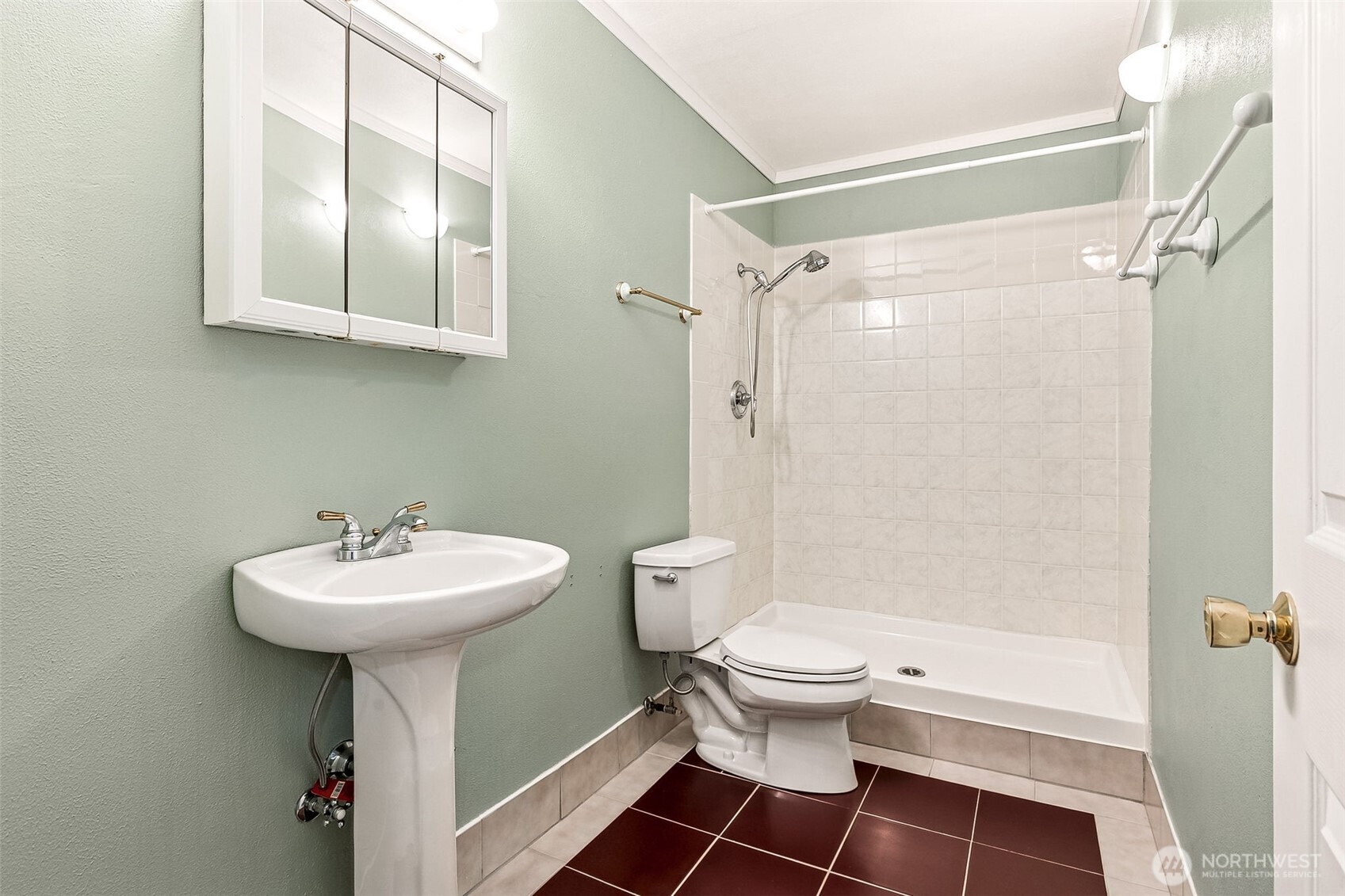 5815 95th Avenue Southwest Olympia, WA 98512 - Photo 18 of 26 a bathroom with a sink toilet and shower