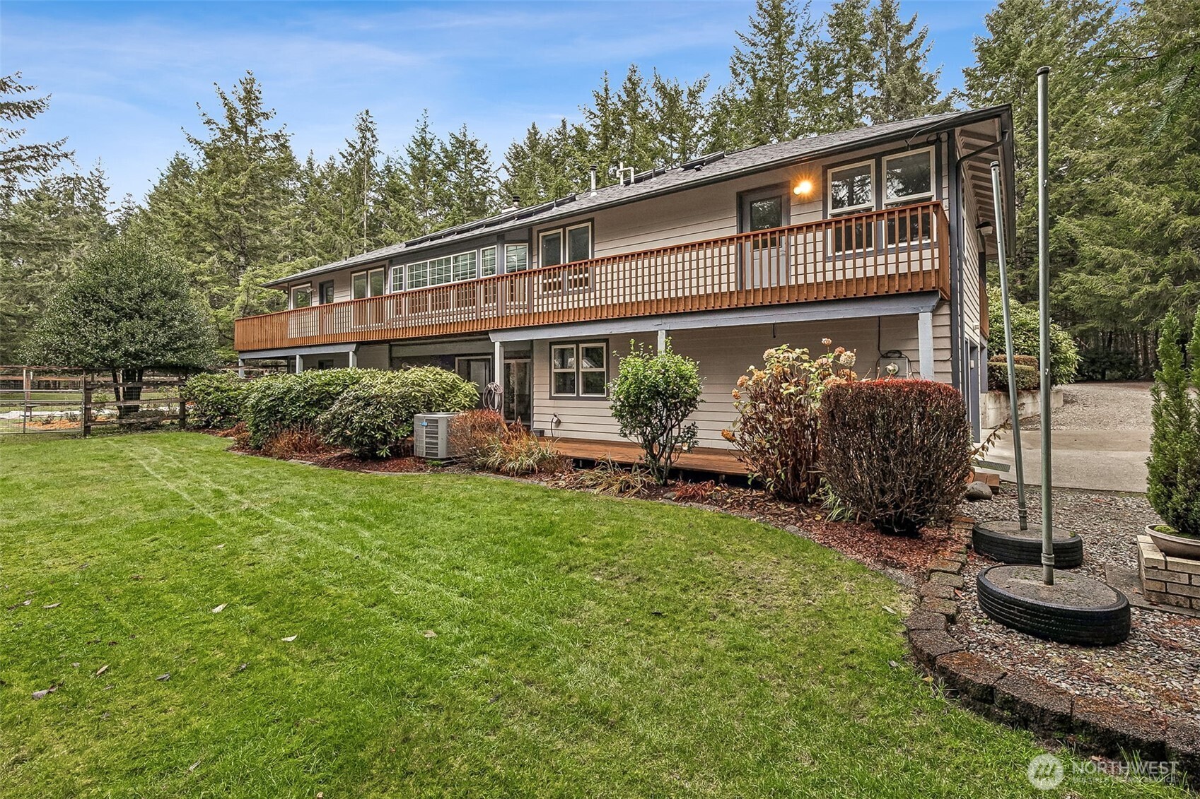 5815 95th Avenue Southwest Olympia, WA 98512 - Photo 21 of 26 a front view of a house with garden