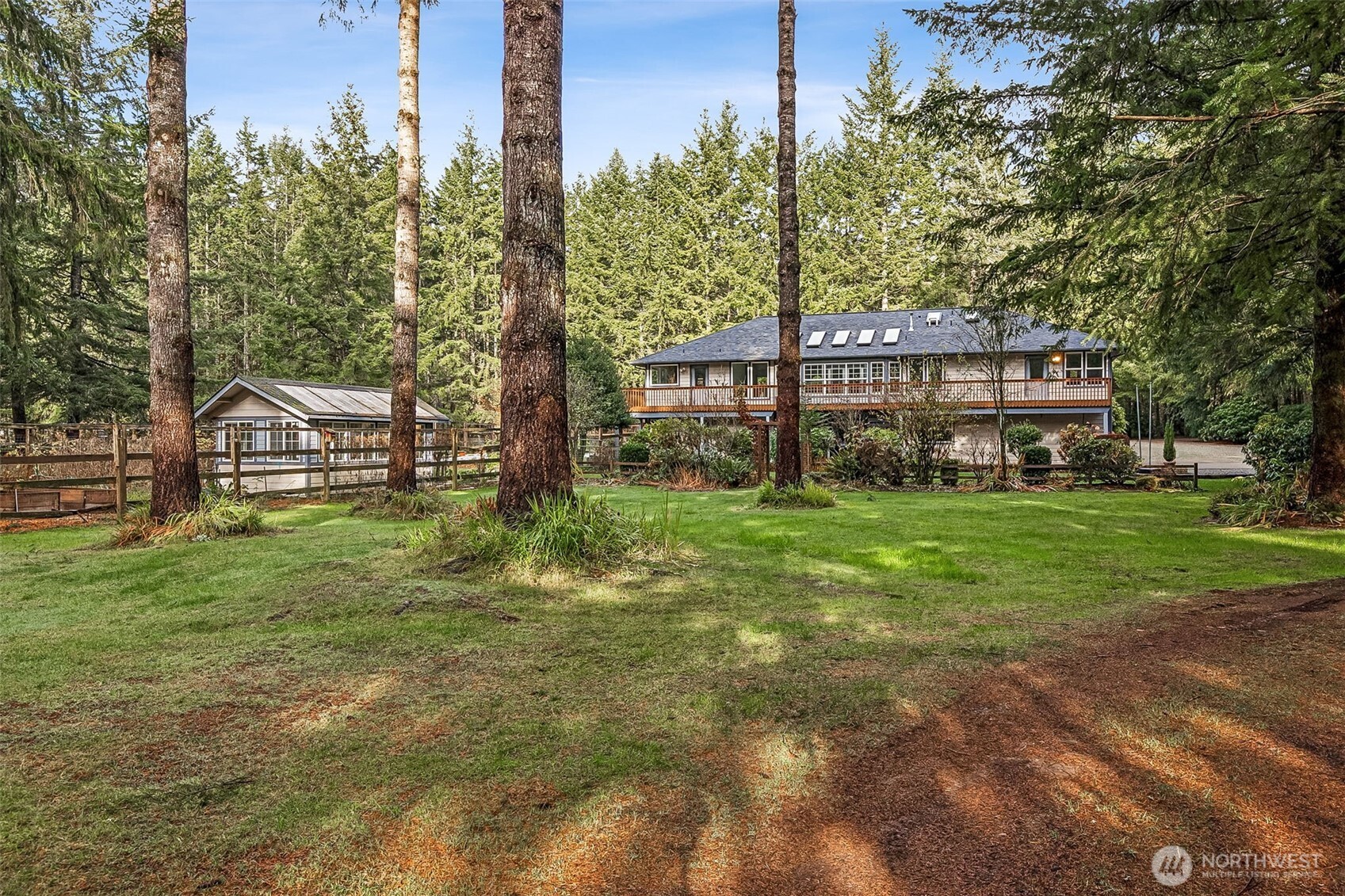 5815 95th Avenue Southwest Olympia, WA 98512 - Photo 26 of 26 a view of a house with a yard