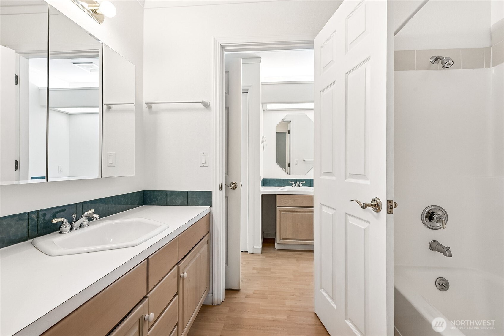 5815 95th Avenue Southwest Olympia, WA 98512 - Photo 7 of 26 a bathroom with a sink a toilet and shower
