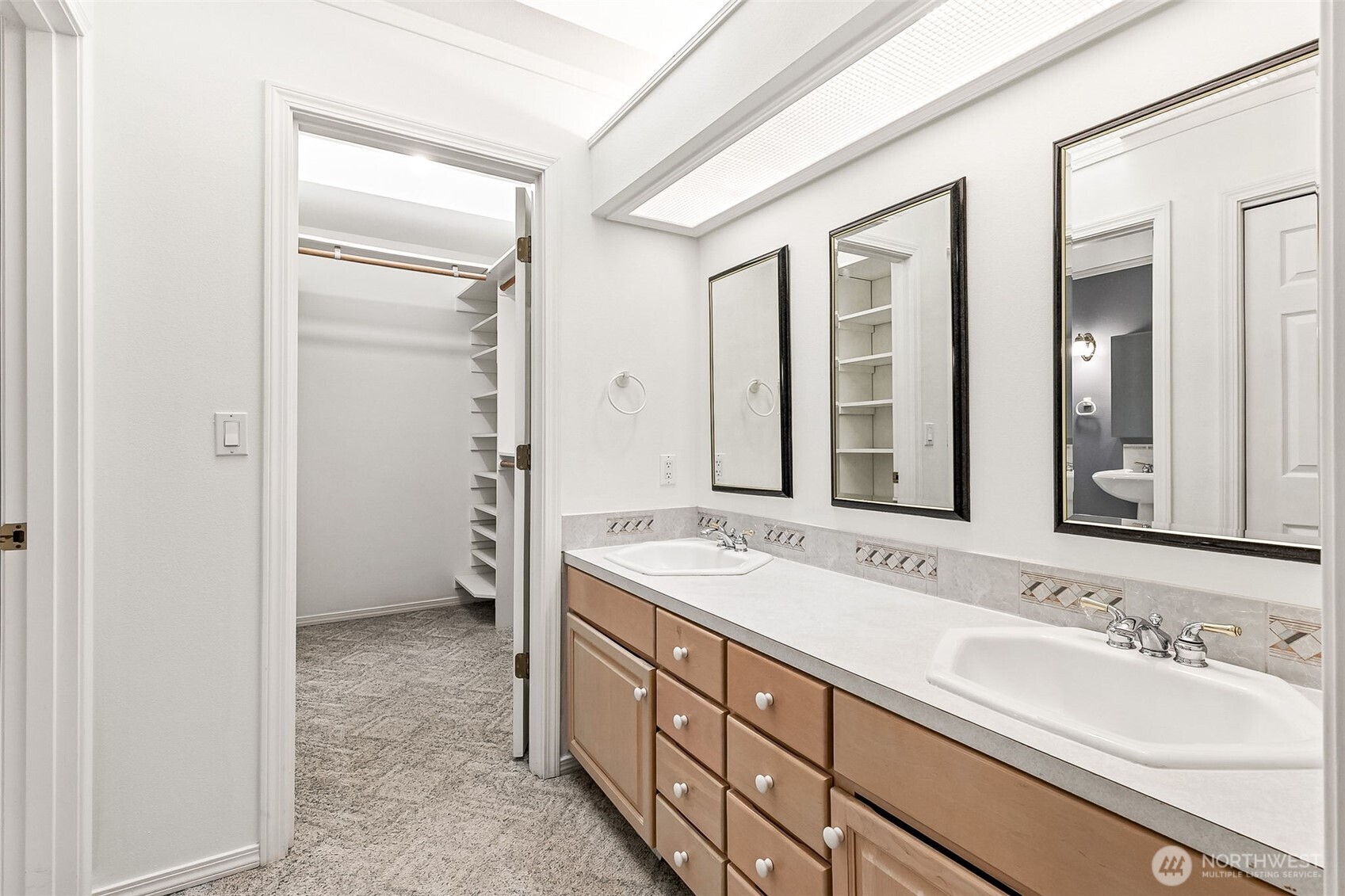 5815 95th Avenue Southwest Olympia, WA 98512 - Photo 10 of 26 a spacious bathroom with double sink and a mirror