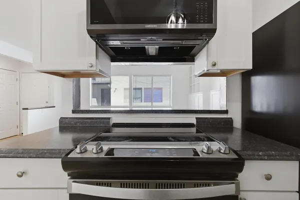 a bathroom with a sink and toilet