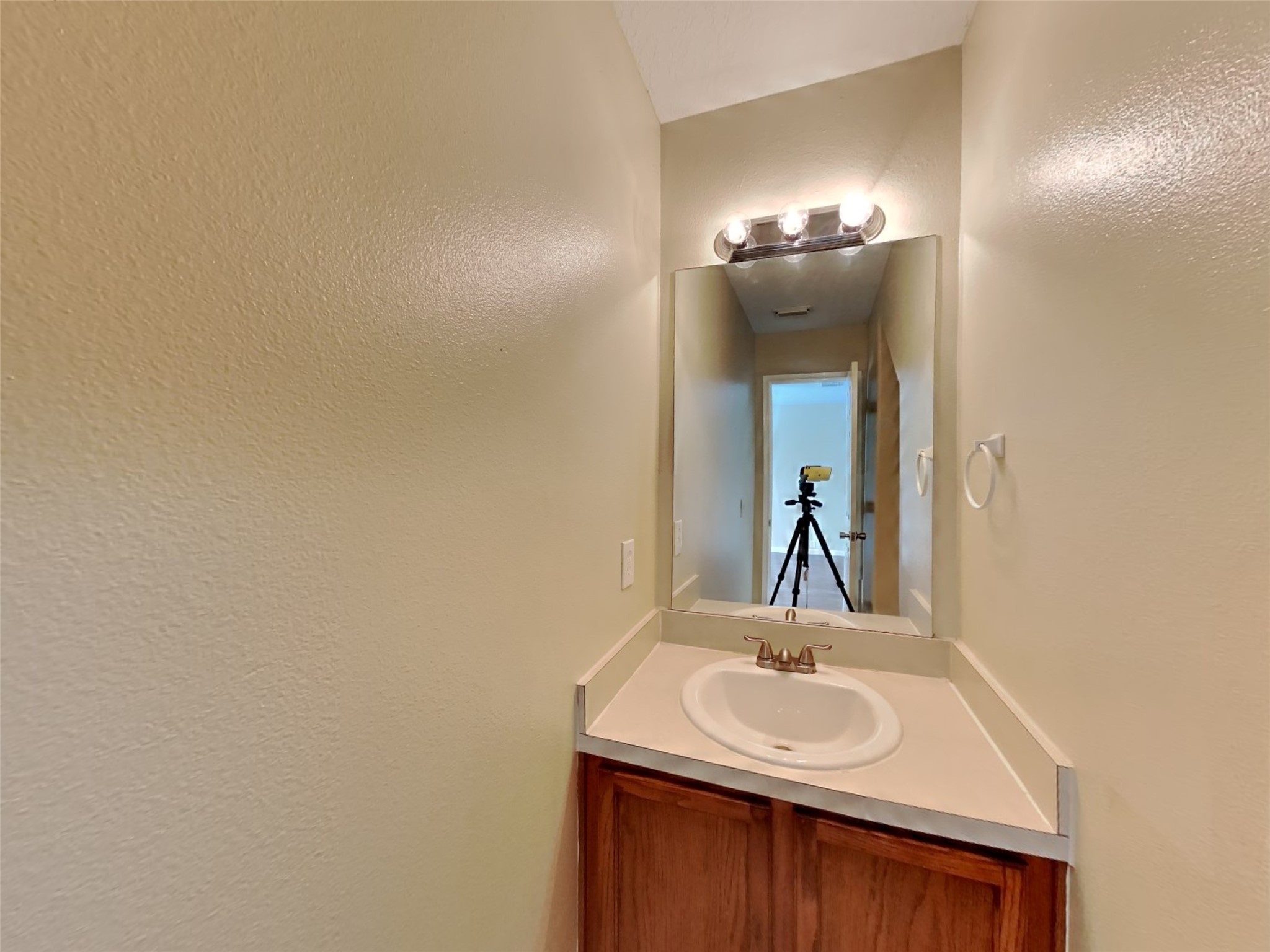 18322 Valiant Brook Court Humble, TX 77346 - Photo 16 of 20 a bathroom with a sink and a mirror