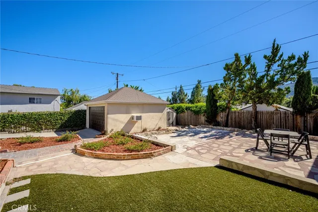 a front view of a house with entertaining space