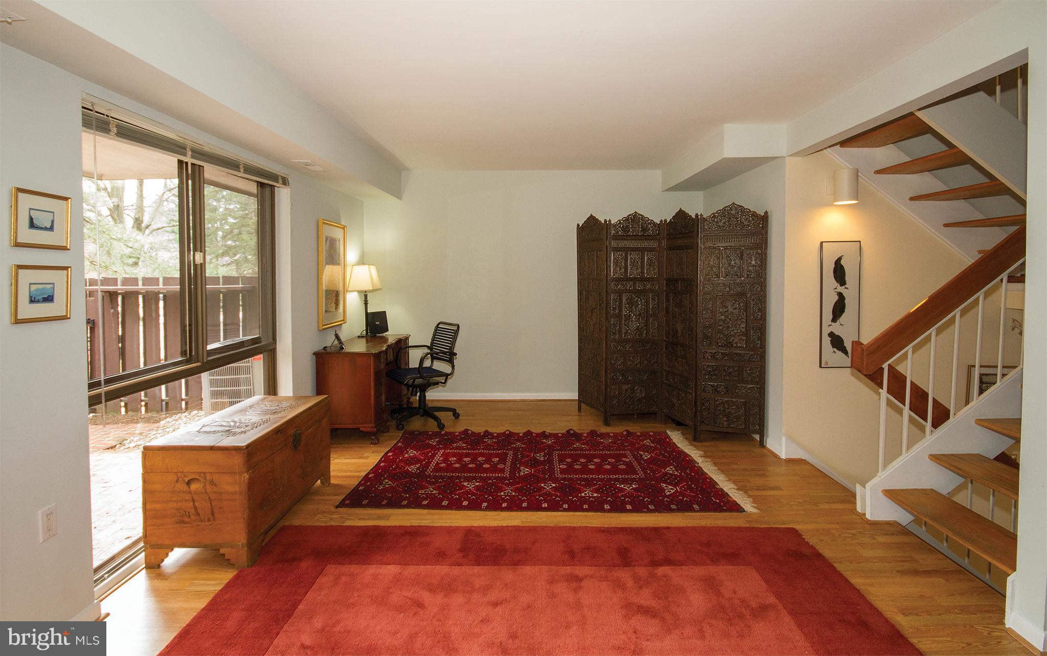 11116 Saffold Way Reston, VA 20190 - Photo 11 of 30 a large rug sitting in a kitchen next to a window
