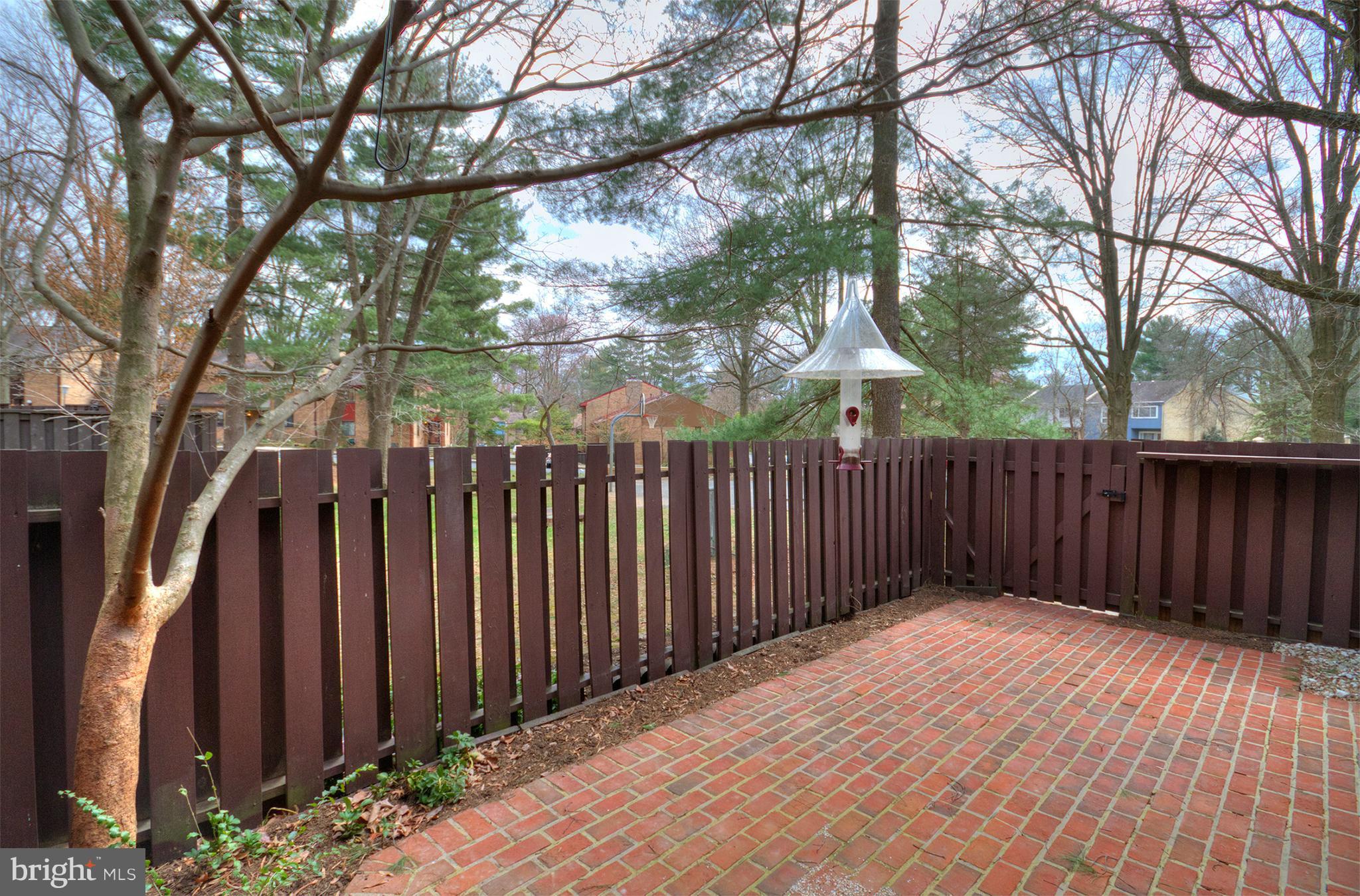 11116 Saffold Way Reston, VA 20190 - Photo 12 of 30 a view of a wooden fence