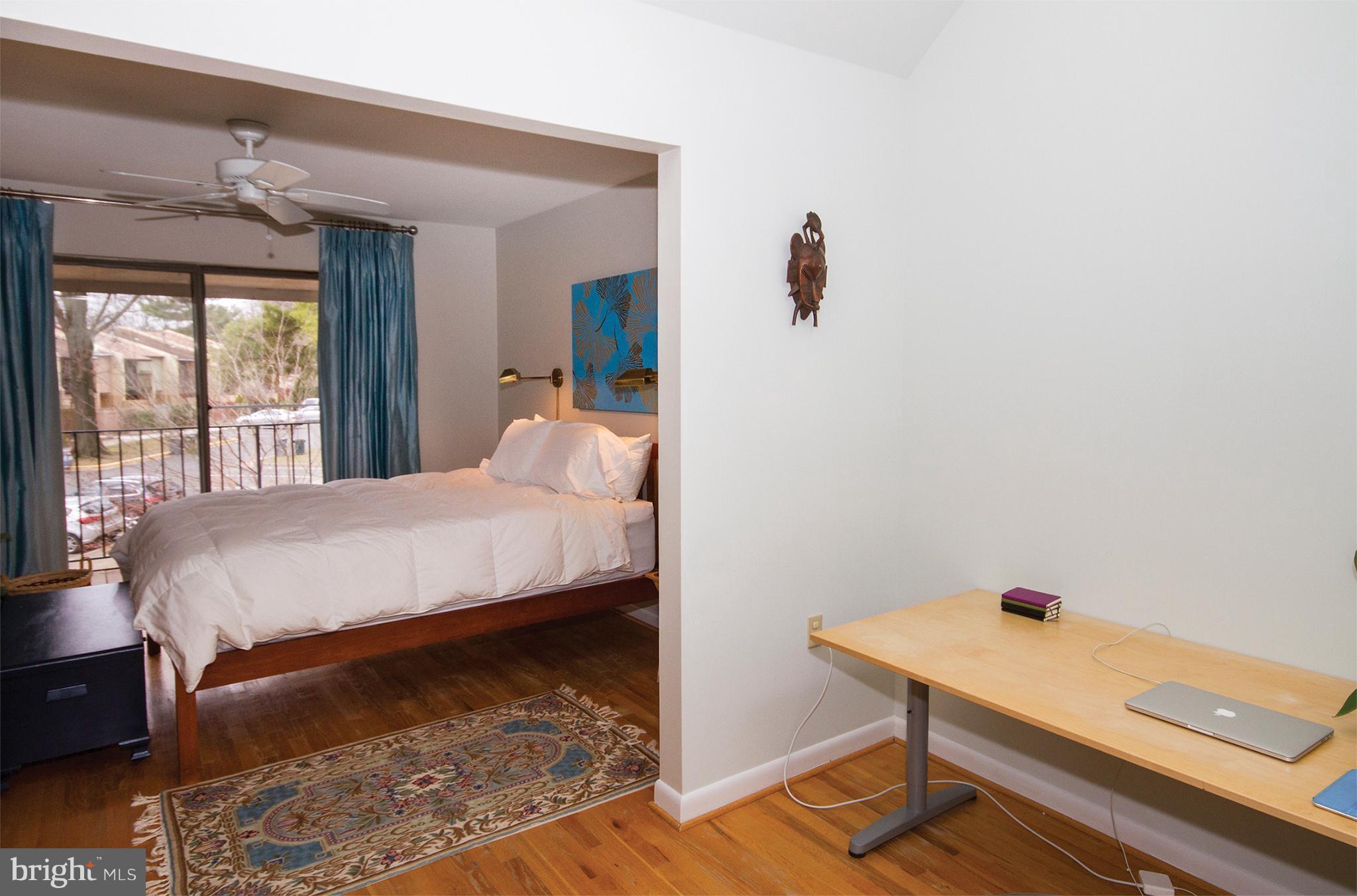 11116 Saffold Way Reston, VA 20190 - Photo 21 of 30 a bed room with a bed and a window