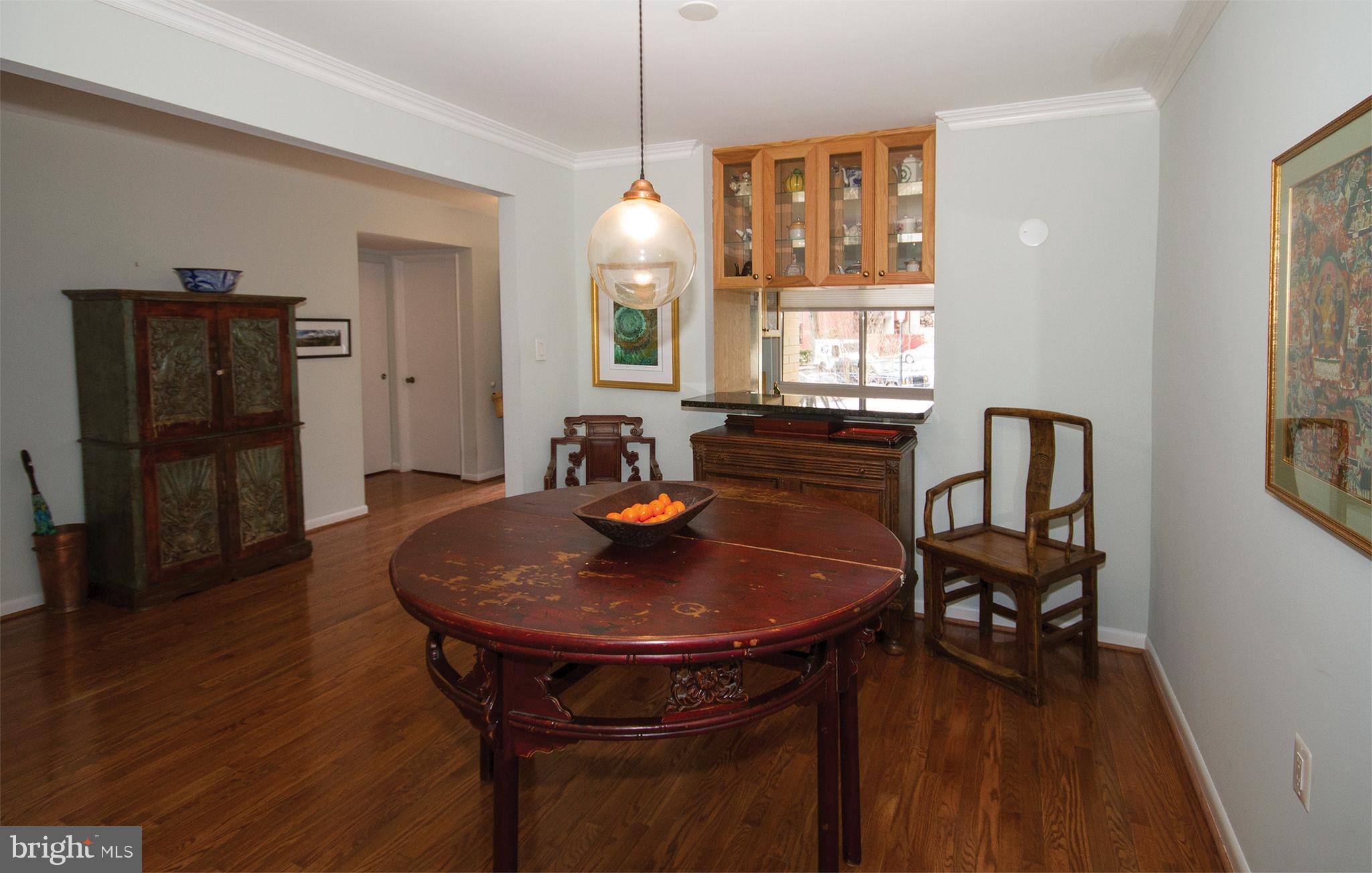 11116 Saffold Way Reston, VA 20190 - Photo 6 of 30 a dining room with furniture and window