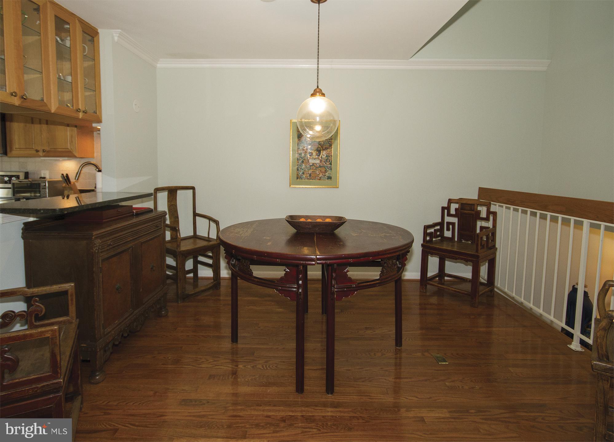 11116 Saffold Way Reston, VA 20190 - Photo 7 of 30 a dining room with furniture and window