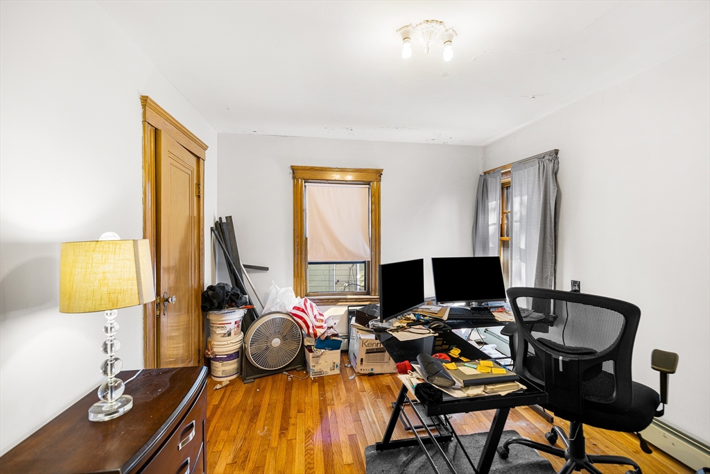 11 Linwood Road Lynn, MA 01905 - Photo 12 of 25 a view of a workspace with furniture and a window