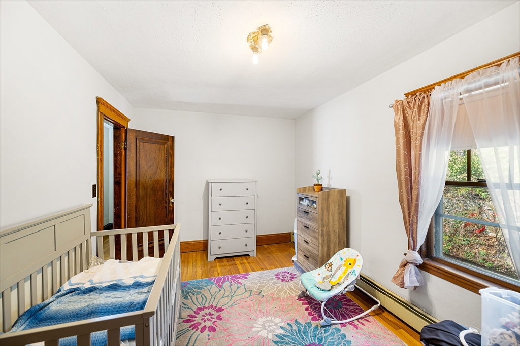 11 Linwood Road Lynn, MA 01905 - Photo 15 of 25 a living room with furniture and wooden floor