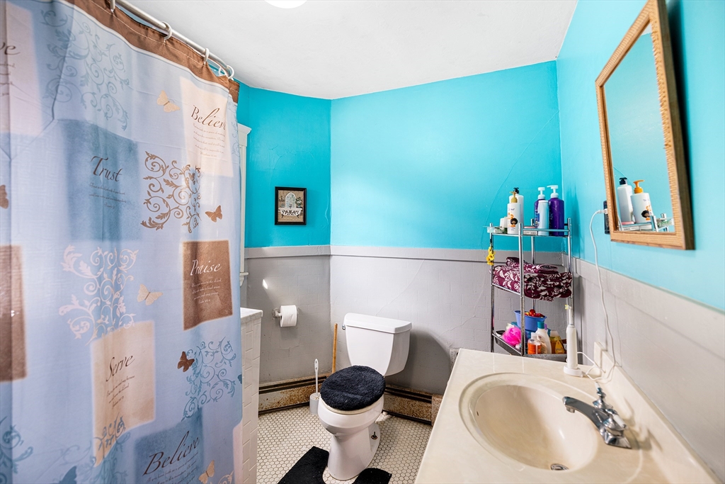 11 Linwood Road Lynn, MA 01905 - Photo 19 of 25 a bathroom with a sink and a mirror