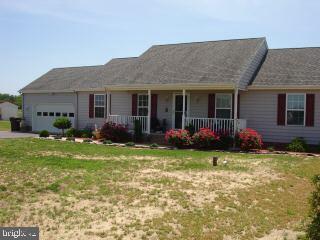 2 Mt Pleasant Road Willards, MD 21874 - Photo 1 of 8 a view of a house with backyard sitting area and garden