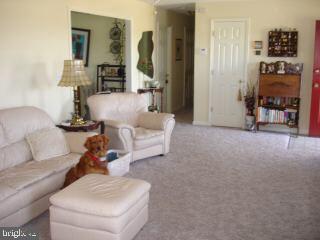 2 Mt Pleasant Road Willards, MD 21874 - Photo 6 of 8 a living room with furniture and a flat screen tv