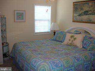 2 Mt Pleasant Road Willards, MD 21874 - Photo 7 of 8 a bedroom with a bed and a window