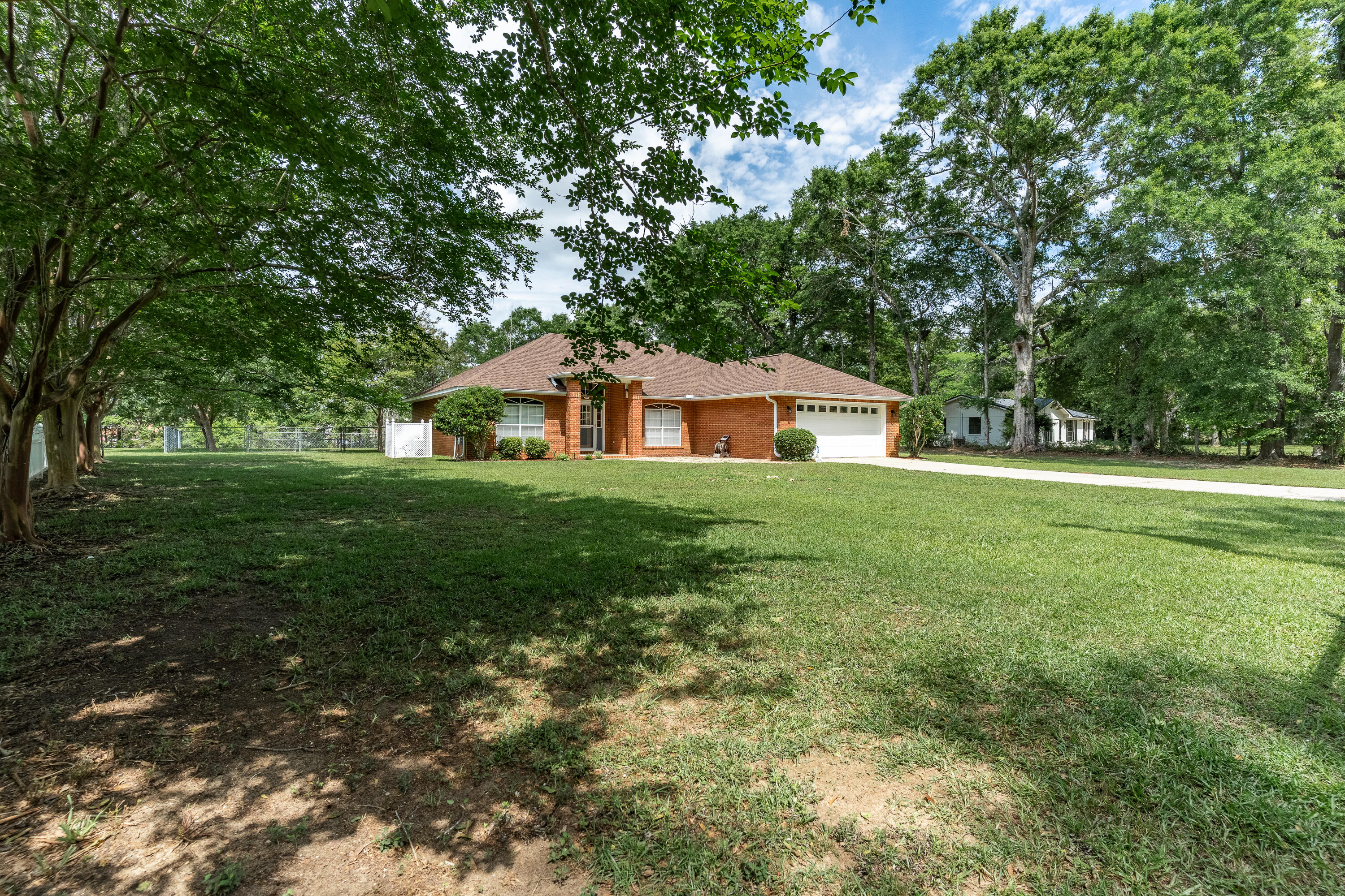 a house view with a garden space