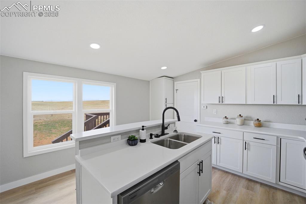 35125 Book Road Yoder, CO 80864 - Photo 22 of 45 a kitchen with a sink cabinets and window