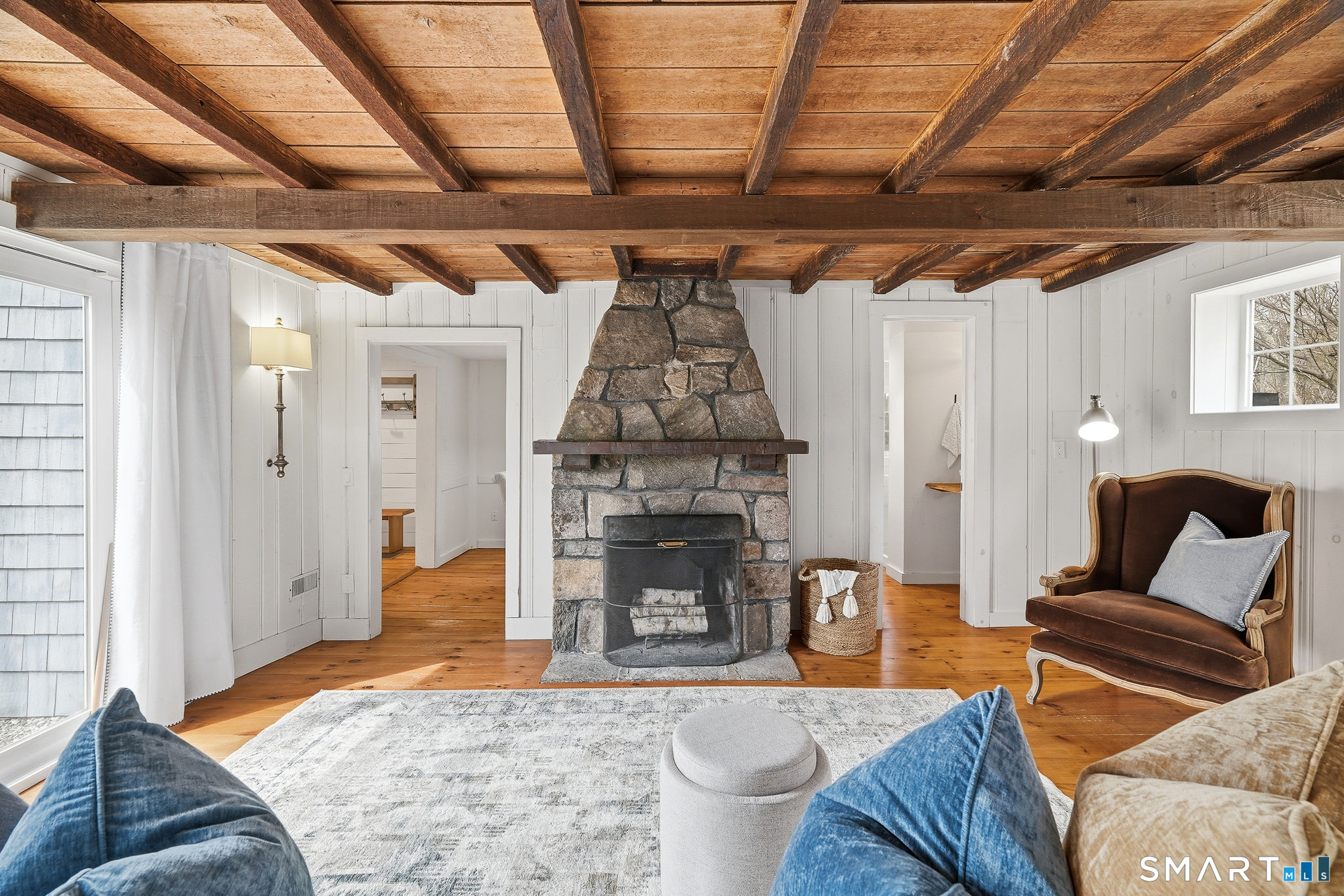 134 Sterling City Road Lyme, CT 06371 - Photo 13 of 38 The wood burning fireplace creates an irresistible focal point.