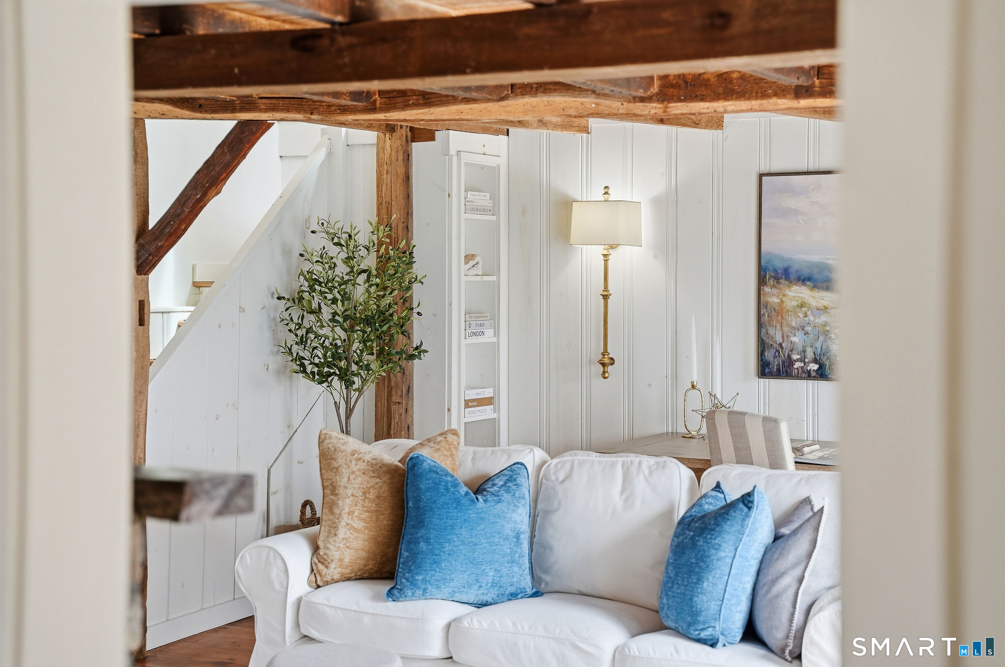 134 Sterling City Road Lyme, CT 06371 - Photo 14 of 38 Steps to the second level create a unique split level flow that maximizes space and adds visual appeal.