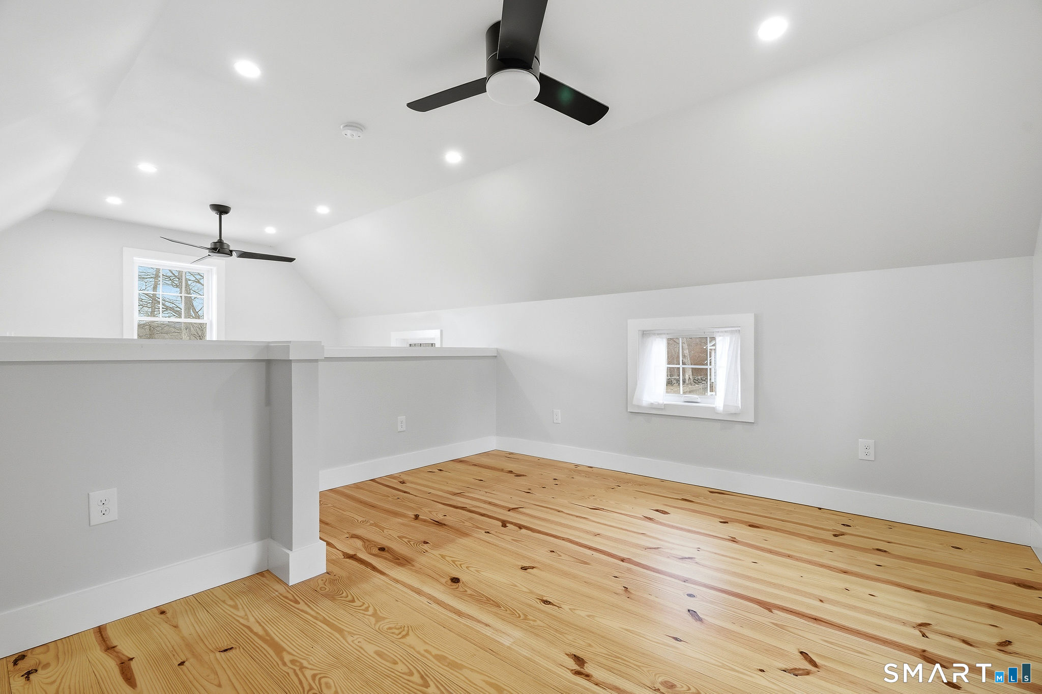 134 Sterling City Road Lyme, CT 06371 - Photo 30 of 38 The barn features an upper level loft, providing additional storage, workspace, or potential studio area.