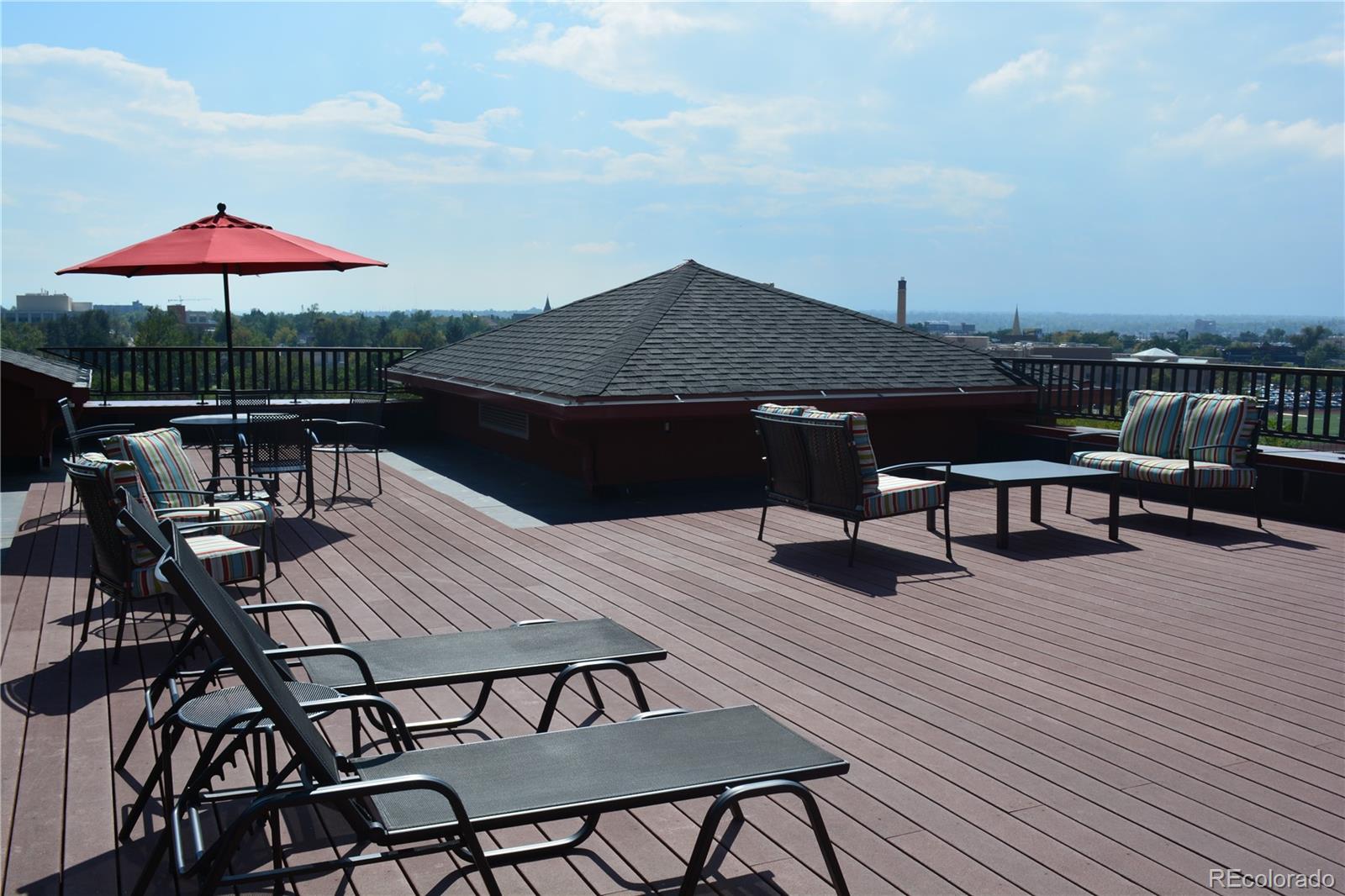 1120 Delaware Street, Unit 311 Denver, CO 80204 - Photo 22 of 25 a terrace view with sitting space and seating space