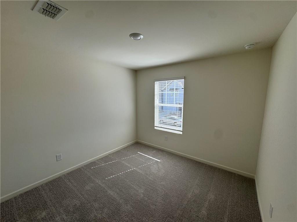 423 Towson Street Villa Rica, GA 30180 - Photo 12 of 19 an empty room with a window