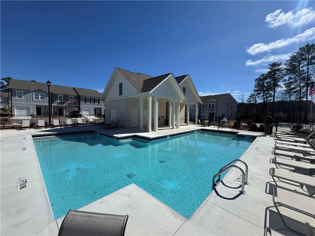423 Towson Street Villa Rica, GA 30180 - Photo 16 of 19 a house view with a garden space