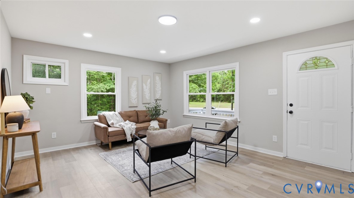 3200 Portugee Road Sandston, VA 23150 - Photo 2 of 26 a living room with furniture and a window