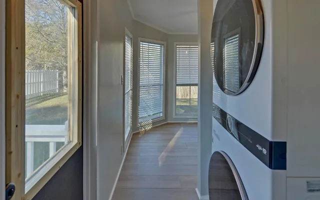 a view of a hallway with windows