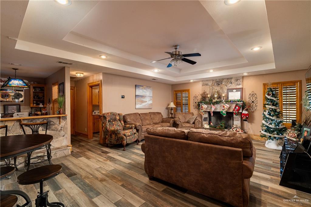 4113 North Fm 493 Road Donna, TX 78537 - Photo 17 of 18 a living room with furniture and a flat screen tv