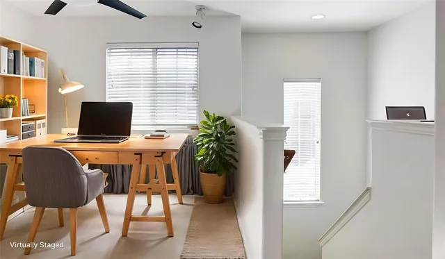 a view of entryway with wooden floor and stairs