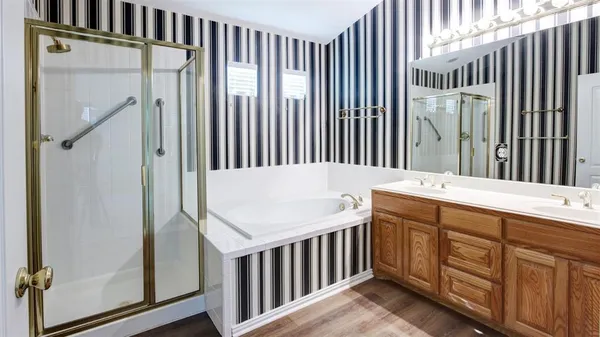 a bathroom with a sink toilet and bathtub