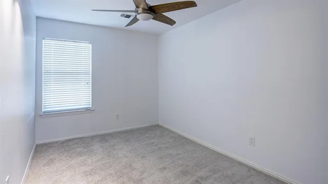 a workspace with furniture and a potted plant