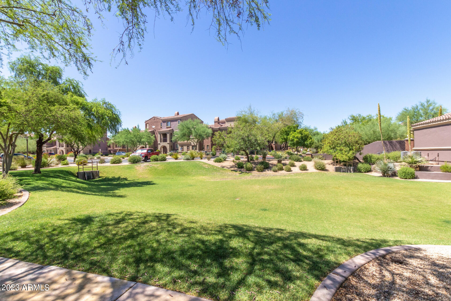 3935 East Rough Rider Road, Unit 1167 Phoenix, AZ 85050 - Photo 43 of 46 Lush green greenbelts
