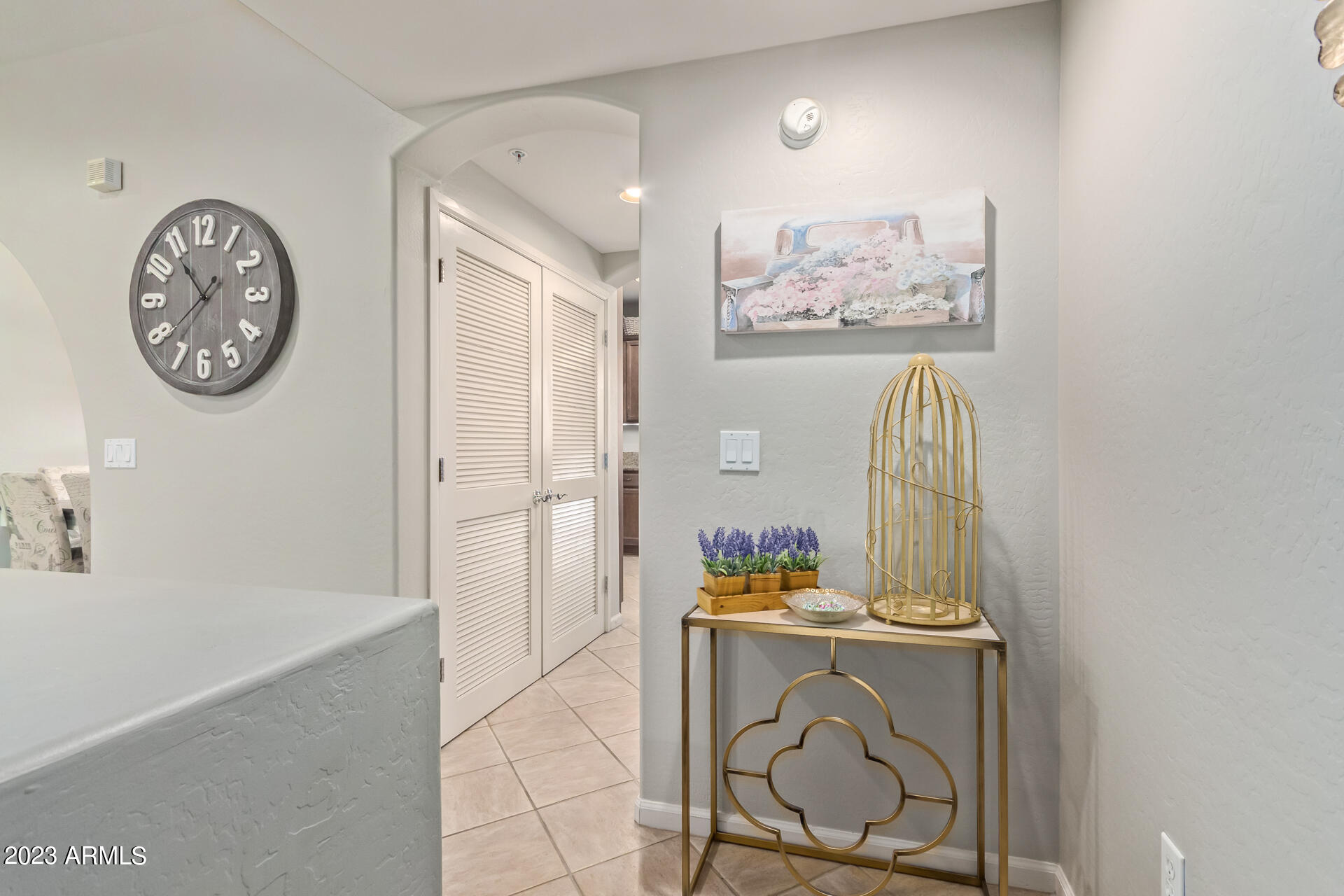 3935 East Rough Rider Road, Unit 1167 Phoenix, AZ 85050 - Photo 6 of 46 walking up to living area
