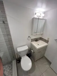 a kitchen with a sink and a stove top oven