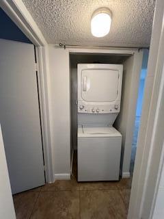 18206 Mediterranean Boulevard, Unit 421 Hialeah, FL 33015 - Photo 16 of 22 a utility room with dryer and washer