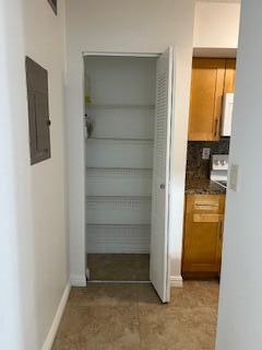 18206 Mediterranean Boulevard, Unit 421 Hialeah, FL 33015 - Photo 18 of 22 a view of walk in closet