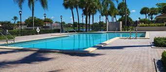 18206 Mediterranean Boulevard, Unit 421 Hialeah, FL 33015 - Photo 19 of 22 a view of a backyard with palm tree