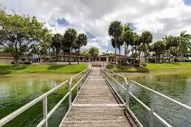 18206 Mediterranean Boulevard, Unit 421 Hialeah, FL 33015 - Photo 20 of 22 a view of lake from balcony
