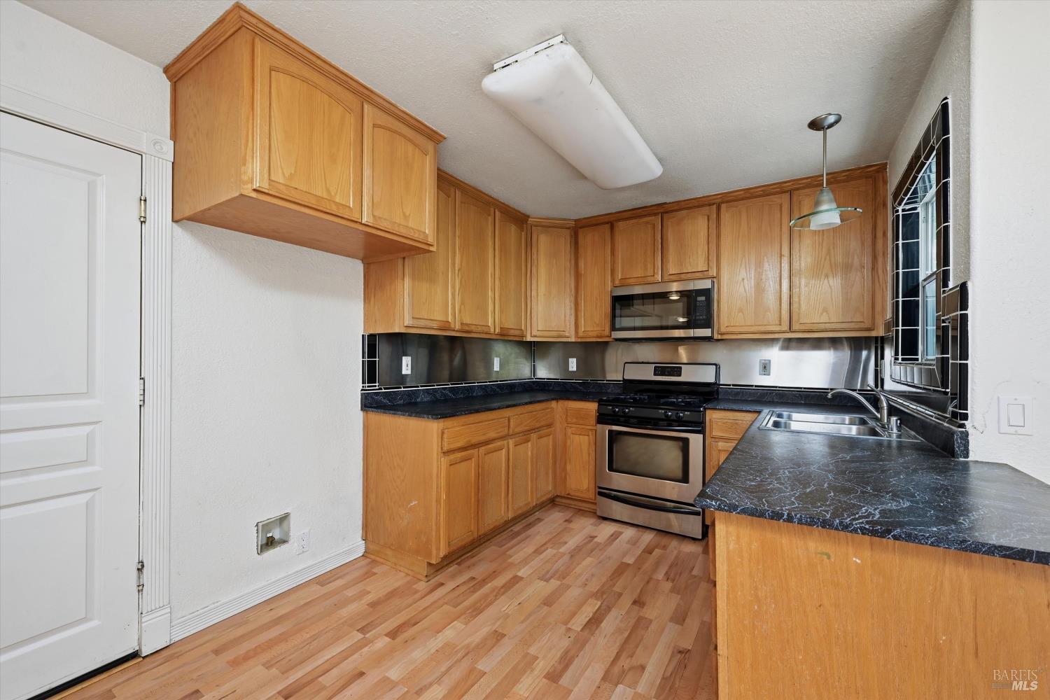 18057 Spyglass Road Hidden Valley Lake, CA 95467 - Photo 10 of 29 Open kitchen.