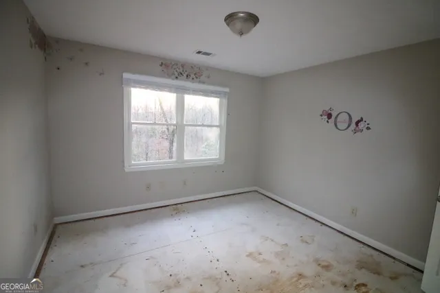 an empty room with a window