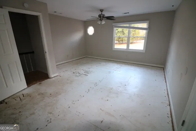 an empty room with windows