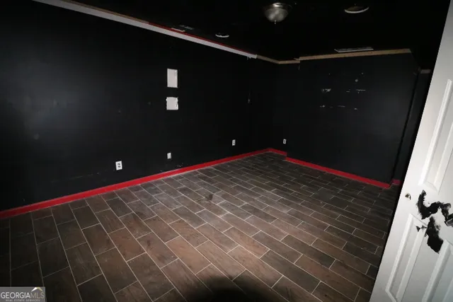 a bathroom with a shower and a toilet