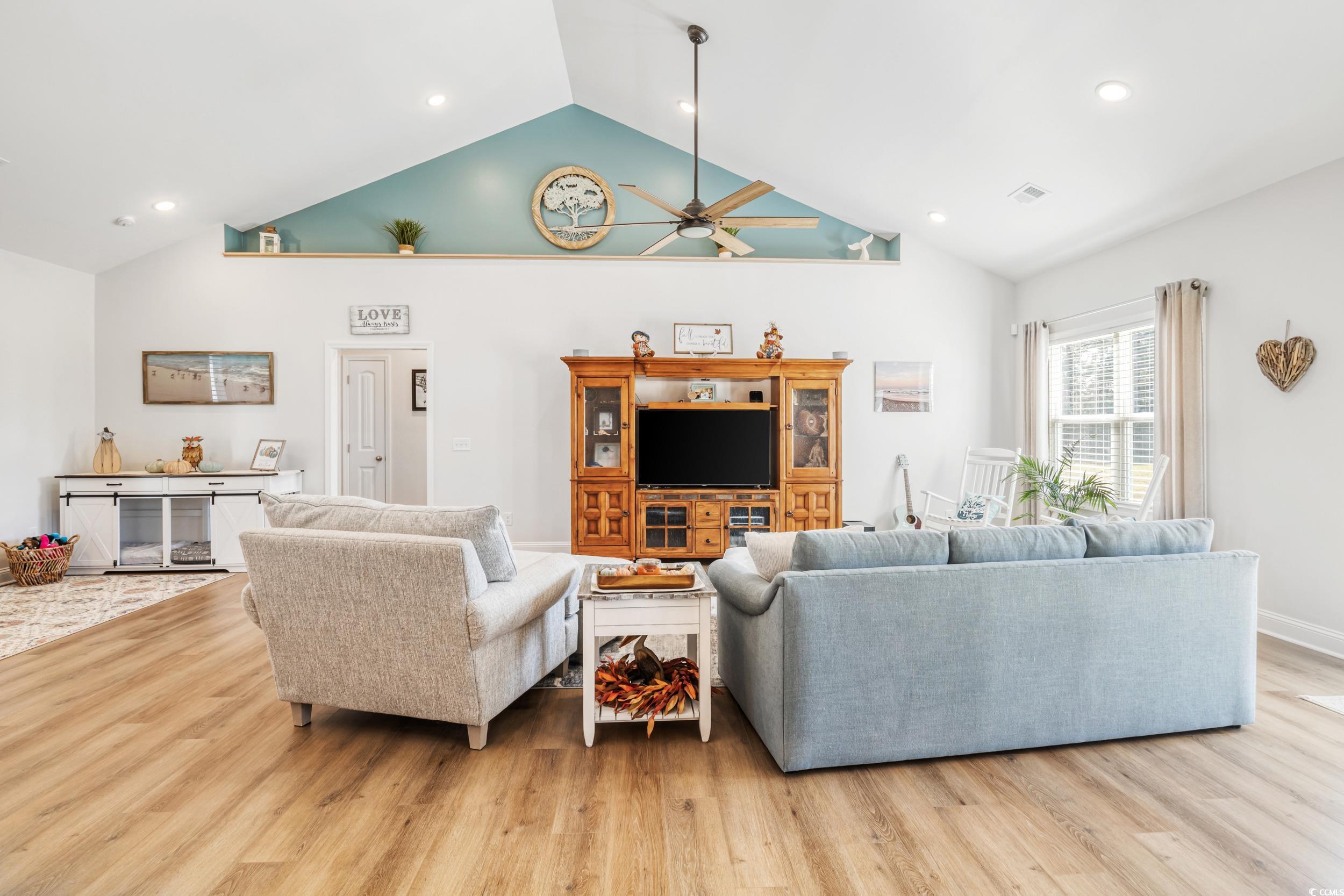 4082 Salem Road Aynor, SC 29511 - Photo 14 of 39 Living room with high vaulted ceiling, light wood-